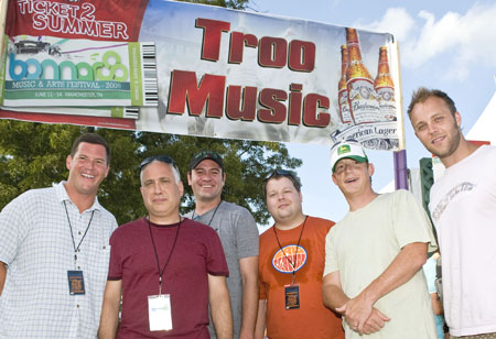 The Troo Music Tent at the Bonnaroo featured Nashville bands The Features, The Protomen, and Heypenny. In addition to sharing Nashville roots, the three groups also won festival slots through The Road to Bonnaroo competition, co-sponsored by BMI, Bud Select, and venue partner, Mercy Lounge. Pictured at the Troo Music Tent are (l-r): BMI Sr. Dir., Writer/Publisher Relations Mark Mason, Bonnaroo co-founder and producer and AC Entertainment President Ashley Capps, Mercy Lounge GM Drew Mischke, BMI Dir. of Writer/Publisher Relations Bradley Collins, BMI Asst. VP Writer/Publisher Relations Clay Bradley, and BMI Assc. Dir., Writer/Publisher Relations Dave Claassen. Photo by Erika Goldring