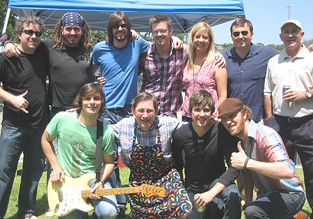 BMI connected country band KingBilly with broadcast giant Clear Channel on May 27 in Texas. Pictured at the CC corporate event are (L-R) standing: CCs Chris Mackenzie, KingBillys Matt Utterback, Josh Matheny, and Donny Fallgatter, CCs Controller Susan Hicks, BMIs Mason Hunter, CCs VP of Finance Rick Mangum. Bottom (L-R): KingBillys Charlie Worsham, CC's CFO Herb Hill, KingBillys Kevin Weaver and John Osborne   