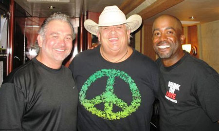 While in Tampa, FL recently for a stop on Rascal Flatts Unstoppable tour, Darius Rucker got the chance to meet one of his heroes, semi-retired professional wrestler Dusty Rhodes - better known as The American Dream. Rhodes is a HUGE country music fan and was thrilled to get to meet Darius.  Pictured L-R: Mike Culotta (WQYK PD), Rhodes & Rucker