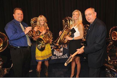  Executives from the C.A.T.S. Foundation, ACM Lifting Lives and Checotah Public Schools including [left to right] Principal Brian Terry, Carrie Underwood, Erin Spahn Director of ACM Lifting Lives, and Gary Haber, President ACM Lifting Lives and Director & Treasurer C.A.T.S. were on hand at Checotah High School to surprise students with more than $117,000 in new music instruments, a joint gift from Underwoods C.A.T.S. Foundation and ACM Lifting Lives.