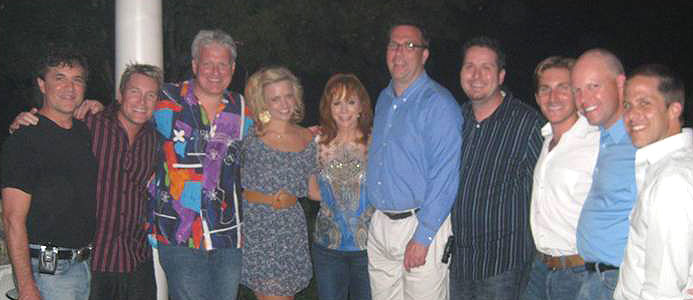 Reba welcomed Clear Channel national programmers and national voice-trackers to her Nashville home Monday evening following a day filled with interviews that will air on Clear Channel stations nationwide. Pictured above (l-r): Valorys Scott Borchetta, Joe Boxer, Michael J. Foxx, Valorys JoJamie Hahr, Reba, Doug Montgomery, Billy Greenwood, Valorys John Zarling, Clay Hunnicutt and Valorys Jon Loba.