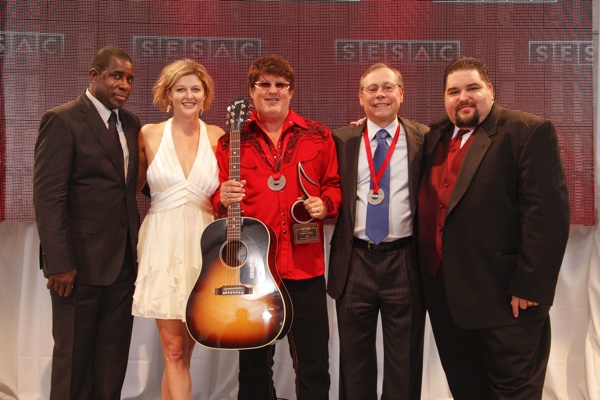  Pictured (left to right): SESAC's Trevor Gale & Shannan Tipton-Neese, Monty Powell, Universal Tunes' Pat Higdon & SESAC's Tim Fink.