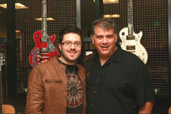 While in Los Angeles, Danny Gokey visited the ACM offices, signed up for professional membership and performed for staffers, offering songs from his forthcoming 19 Recordings/RCA Nashville debut album, set to release in spring 2010. (Photo L-R: Danny Gokey, Bob Romeo, ACM Executive Director) Photo: Getty Images/Courtesy of ACM