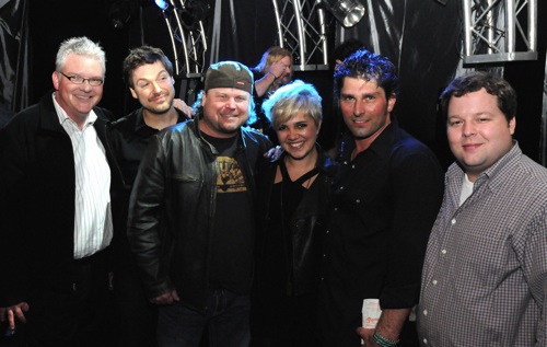 Pictured are (l-r): BMIs Perry Howard, Pahanishs guitarist Tom Bukovac, Wright of Center Musics Cole Wright, band member Kristin Lee, Dave Pahanish, and BMIs Bradley Collins.