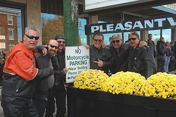  Left to right, Steve Pugliese, Jeff Hill, Rich Bredbenner, Pat Garrett, Joe  Dell, and Bob Stevenson have a laugh at the sign outside The Bridge Inn in Pleasantville where dozens of  motorcycles were parked, with permission by owners, during the taping of Garrett's new video "Wild Hog".