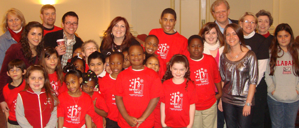 Jo Dee Messina with the Harvest Hands Board of Directors, Concert Organizers and Harvest Hands Kids prior to the Dec. 5th benefit concert