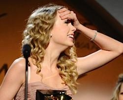 Taylor Swift winning Album of the Year.