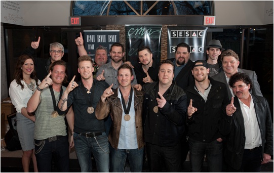 Pictured (L-R): Front Row  BMI's Penny Everhard; Florida Georgia Line's Tyler Hubbard and Brian Kelley; co-writers Jesse Rice, Joey Moi, and Chase Rice; and Big Machine Label Group's Scott Borchetta; Back Row (l-r): Republic Nashville's Jimmy Harnen; Big Loud Mountain's Craig Wiseman, Seth England, and Kevin "Chief" Zaruk; SESAC's Tim Fink; Artist Revolution Publishing's Sam Brooker; and BMI's David Preston. Photo Credit: Steve Lowry