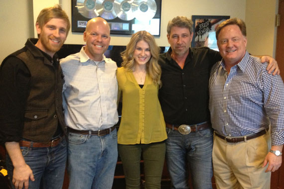 The Henningsens recently met up with Clear Channels Clay Hunnicutt at Sony Musics Nashville office. The family's latest single, "America Beautiful," takes our No. 60 spot this week. Pictured (L-R): Aaron Henningsen; Clay Hunnicutt (SVP of Programming at Clear Channel); Clara Henningsen; Brian Henningsen; and, Gary Overton (Chairman & CEO, Sony Music Nashville).