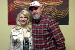 Josey Milner visited with Renegade Radio Nashville to promote her debut single, "Not Pretty Enough. The young singer will be performing at a Renegade Radio showcase concert on February 8 at Nashvilles Hard Rock Cafe. Pictured (L-R): Josey and Captain Jack.