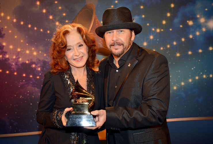 Bonnie Raitt and George J. Flanigen IV (Recording Academy Chair) backstage at the 55th Annual GRAMMY Awards Pre-Telecast Ceremony. Photo: Rick Diamond/WireImage