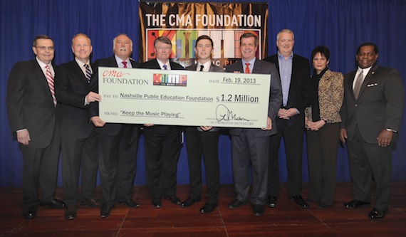 The CMA Foundation donated $1.2 million to benefit music education programs for Nashvilles public schools last night at the Schermerhorn Symphony Center. (l-r) CMA Board President, Ed Hardy; CMA Board Chairman, Troy Tomlinson; CMA Chief Executive Officer, Steve Moore; Director of Metropolitan Nashville Public Schools, Dr. Jesse Register; Scotty McCreery; Nashville Mayor Karl Dean; Chevrolet National Promotions Manager, Michael Weidman; Chair of The CMA Foundation Board of Directors, Kitty Moon Emery; and Nashville Public Education Foundation Board Chair, Michael Carter, Sr. Photo credit: Donn Jones/CMA