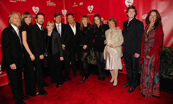  Pictured (L-R): President/CEO of The Recording Academy, MusiCares and the GRAMMY Foundation Neil Portnow; Sr. Vice President of MusiCares and the GRAMMY Foundation Kristen Madsen; Chair of the Board of The Recording Academy, and MusiCares and GRAMMY Foundation Board Member George J. Flanigen IV; Vice President of MusiCares and the GRAMMY Foundation Dana Tomarken; MusiCares Board Chair Scott Pascucci; MusiCares Person of the Year honoree Bruce Springsteen, with wife Patti Scialfa; daughter Jessica Springsteen; mother Adele Springsteen, and guests and members of his family. Courtesy of The Recording Academy/WireImage.com, photo by Kevin Mazur  2013.