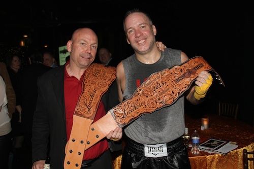 Pictured (L-R): Jimmy Rector (EMI Nashville) and Keith Gale (RCA) display their Lucchese Rumble on the Row hand-tooled championship belts.Photo: Karen Will Rogers