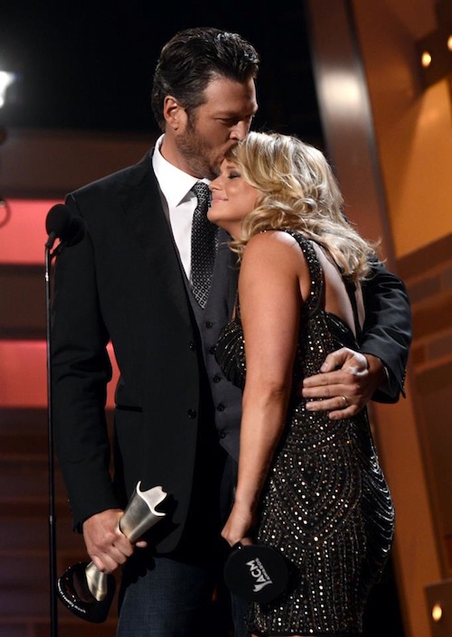 Blake Shelton and Miranda Lambert celebrate their award win.