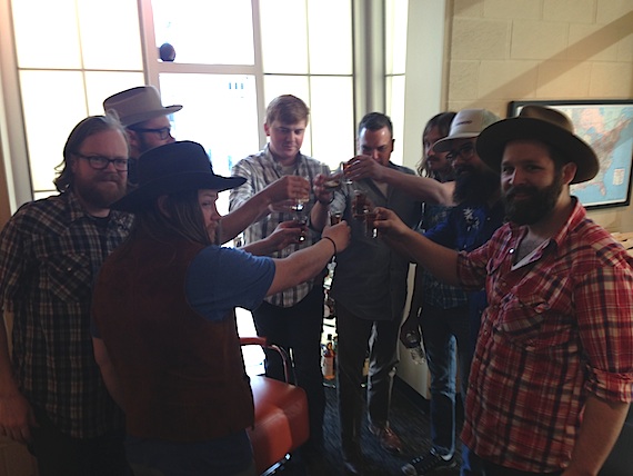 Pictured (L-R): Sam Anderson (QCNH), Andrew Skates (QCNH), David Matsler (QCNH), Matt Runner (Paradigm), Brian Hill (Paradigm), Matt Mabe (QCNH), Patrick Adams (QCNH), Wayne Floyd (QCNH Tour Manager)