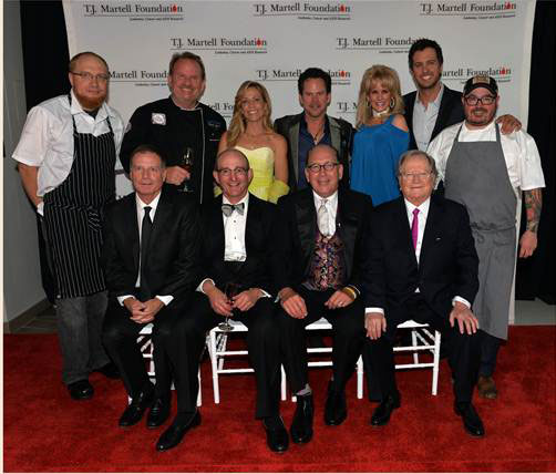 Back Row (L to R) Chef Sam Tucker, Chef Bob Waggoner, Sheryl Crow, Gary Allan, Laura Heatherly (CEO, T.J. Martell Foundation), Luke Bryan, Chef Sean BrockFront Row (L to R) Co-chair Bill Hearn (President, EMI Christian Group), Co-chair Tom Black, Co-chair John Esposito (President & CEO, Warner Music Nashville), Founder Billy Ray Hearn (Founder, EMI Christian Music Group)