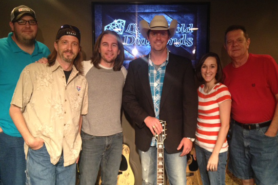 LandStar Entertainment's Adam Fears visited the staff at WUSY Chattanooga and performed his new single "There's a Girl Out There. Pictured (L-R): Cowboy Kyle, Styckman, Gator Harrison, Adam Fears, Melissa Wagner, Bill "Dex" Poindexter.