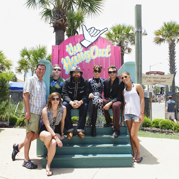 Luella & the Sun gather with BMI's Mark Mason, Brook Ivey and Penny Everhard in an oversized beach chair at Hangout Music Fest on Friday, May 17, 2013.