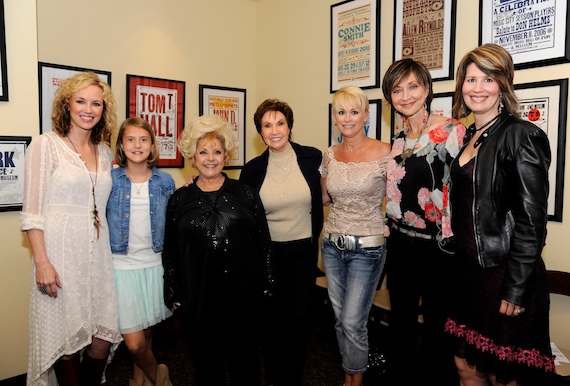 Pictured (L-R): Kristen Kelly, Emma Shudde, Brenda Lee, Jan Howard, Lorrie Morgan, Pam Tillis and Lisa Brokop. 