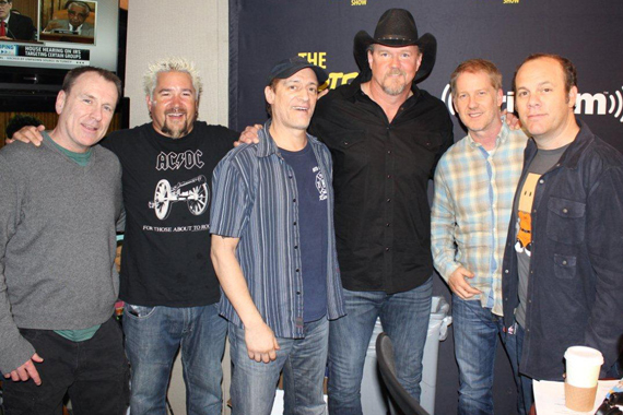 Opie & Anthonys SiriusXM show invited Trace Adkins, Colin Quinn, Guy Fieri, and Tom Papa on air in New York City on Friday, May 17. Pictured (L-R): Colin Quinn, Guy Fieri, SiriusXM host Anthony Cumia, Trace Adkins, SiriusXM host Opie Hughes, Tom Papa. Photo: Erik Nagel