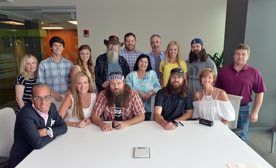 Standing L to R: UMG Nashville SVP, Marketing Cindy Mabe, John Luke Robertson, Sadie Robertson, Si Robertson, UMG Nashville SVP, Promotion Royce Risser, Miss Kay Robertson, UMG Nashville SVP, A&R Brian Wright, Jessica Robertson, Jep Robertson, UMG Nashville COO Tom Becci. Seated L to R:  Greenberg Traurig, LLP Attorney Jess L. Rosen, Korie Robertson, Jase Robertson, Missy Robertson. Photo Credit: Peyton Hoge 