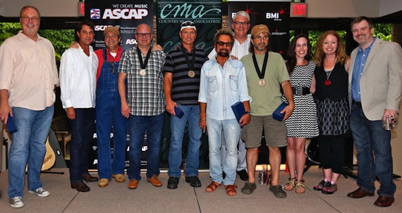 Pictured (L-R): UMG Nashville's Mike Dungan, ASCAP's Michael Martin, HoriPro Entertainment's Butch Baker, co-writers Mark Bright and Tim James, Tony Brown, BMI's Perry Howard, co-writer Phil O'Donnell, Delbert's Boy Music's Kirsten Wines, and Warner/Chappell's Alicia Pruitt and Ben Vaughn. Photo by Ed Rode. 