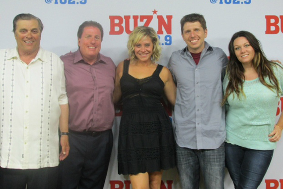 Flying Island's Gwen Sebastian celebrates her album release and latest single Suitcase with the staff of KMNB, Minneapolis. Pictured (L-R): Mick Anselmo (Sr. VP), Rob Morris (PD), Gwen, Tommy Jay (APD), and Tricia Jenkins (MD).