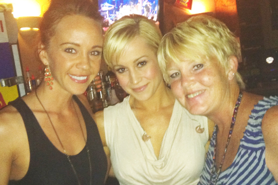 Kellie Pickler recently visited with KMDL/Lafayette's Stephanie Crist during her 18th CMA Music Fest before playing a show at The Stage on Friday night in Nashville. Pickler lands at No. 44 on this weeks MusicRow Chart with her debut Black River single Someone, Somewhere Tonight. Pictured (L-R):  Megan Boardman (Black River), Kellie Pickler, Stephanie Crist