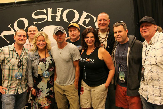 Kenny Chesney caught up with radio programmers before a sold-out show at Lincoln Financial Field in Philadelphia. Chesneys latest single, When I See This Bar, is this weeks greatest spin increase. Pictured (L-R): Jeff Hurley (Clear Channel Harrisburg/Allentown OM), Dave Hovel (WXCY Wilmington, DE PD), Tanya Burko (WGGY Wilkes-Barre APD/MD), Chesney, Joe Kelly (WPUR Atlantic City), Shelly Easton (WXTU Philadelphia PD), Mark Razz (WXTU Philadelphia APD/MD), David Friedman (Columbia Nashville Promo), Scot Michaels (Morris Management)