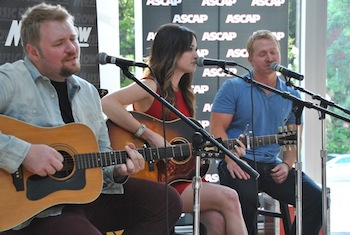 (L-R): Josh Osborne, Kacey Musgraves and Shane McAnally perform "Merry Go 'Round." Photo: Isabel Ross