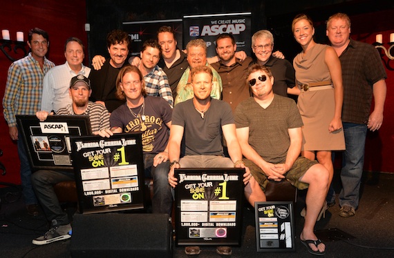 Pictured (L-R): co-writer Chris Tompkins, Florida Georgia Lines Tyler Hubbard and Brian Kelley, and co-writer Rodney Clawson; (back row, l-r): ASCAPs Michael Martin, BMIs Jody Williams, Big Machine Label Groups Scott Borchetta, Big Loud Mountains Kevin (Chief) Zaruk, producer Joey Moi, Big Loud Shirts Craig Wiseman and Seth England, Republic Nashvilles Jimmy Harnen, BMIs Penny Everhard, and ASCAPs Mike Sistad. Photo by Rick Diamond