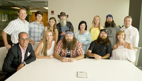 Pictured are (back row, L-R): BMIs Clay Bradley, John Luke Robertson, Sadie Robertson, Si Robertson, Kay Robertson, Missy Robertson, Jep Robertson and BMIs Jody Williams; (front row, L-R): attorney Jess Rosen of Greenberg Traurig, Missy Robertson, Willie Robertson, Jase Robertson and Jessica Robertson.  Photo by Erika Goldring