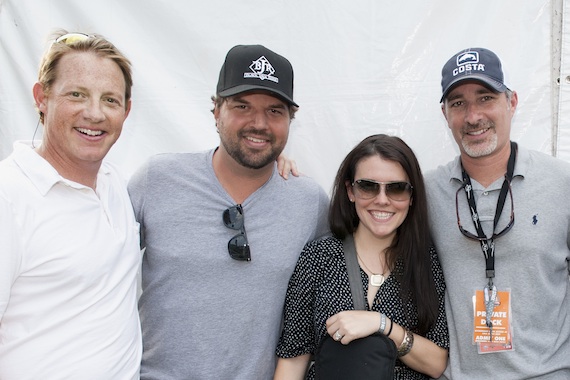 Pictured (L-R): BMI's Clay Bradley, Dallas Davidson, Native Run's Annie Clements and Universals Steve Hodges gather for a photo backstage at the BMI Tailgate Party outside LP Field during 2013 CMA Music Festival. (Erika Goldring Photo)