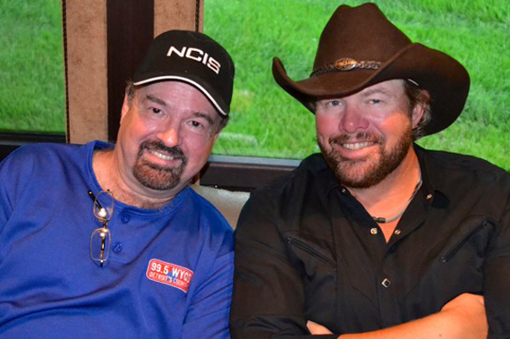 Toby Keith (R) brought his Hammer Down Tour to Detroit and before the show, had some couch time with WYCD Morning show host Dr. Don Carpenter (L)