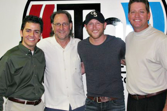 Cole Swindell continued his radio tour with a stop in Oklahoma City, OK to meet with KJKE in support of his debut No. 49 Warner Bros. single Chillin' It. Pictured (L-R): Owen Pickard (KJKE MD), Mark Niederhauser (WMN), Cole Swindell and Kevin Christopher (KJKE PD).