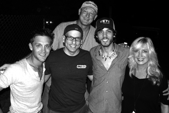 Bigger Picture Groups Chris Janson recently visited with KMLE about his soon-to-be released single Cut Me Some Slack before opening for Dierks Bentley at the annual Country Thunder festival (7/19) in Twin Lakes, WI. Pictured (L-R) Front: Justin Moore, Tim Richards (KMLE PD), Janson, Kelly Lynn Janson. Back: Tim Pohlman (KMLE GM)