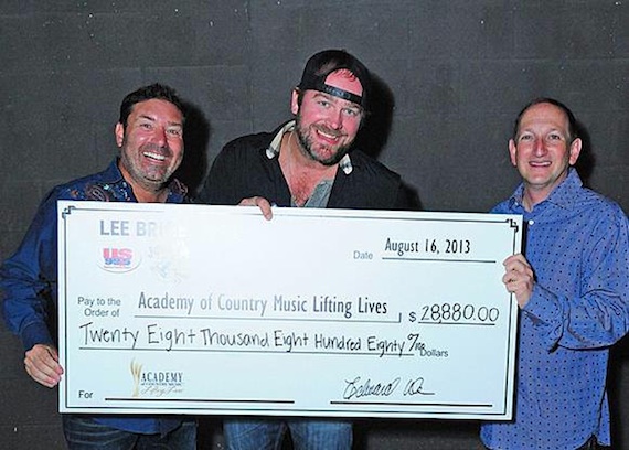 Pictured (L-R): Tommy Disanto, Joes Bar Co-Owner; Lee Brice; Ed Warm, Joes Bar Co-Owner and ACM Lifting Lives and ACM Board Member). 