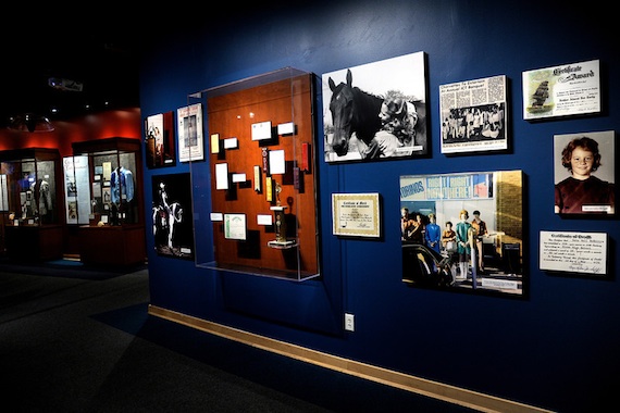 Photos and memorabilia from the 'Reba: All The Women I Am' exhibit at the Country Music Hall of Fame.