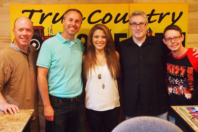 Sony Music Nashville recording artist Angie Johnson recently performed at WEIOs Barn Bash in promotion of this weeks No. 32 single, Swagger." Pictured (L-R): RG Jones, Sony Music Nashville; Kelly Green, WEIO GM; Angie Johnson; WEIO on-air personality Ken Folkes; and Sony Music Nashville's Rusty Sherrill.