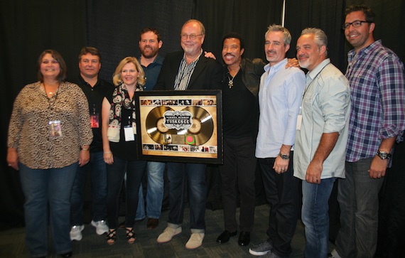 Pictured (L-R):  Ellen Powers, Tom Becci, Katie Dean, Royce Risser, Mike Dungan (UMGN Chairman & CEO), Lionel Richie, Brian Wright, Damon Moberly and Tom Lord.