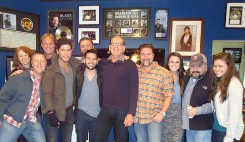 Top Row: (L-R) Lisa Ray (VP, Brand Management), Scott Hendricks (SVP, A&R), Jordan Pettit (Dir., National Promotion)Bottom Row: (L-R) Tom Martens (Southeast Regional, Promotion), Dan Smyers, Shay Mooney, John Esposito (President & CEO, WMN), Chris Stacey (SVP, Promotion), Abby Law (Midwest/Northeast Regional, Promotion) Chris Palmer (VP, Promotion), Jessica Rouse (Coordinator, Promotion) 