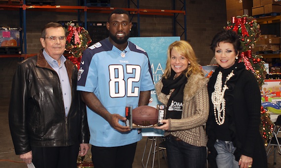 Pictured (L-R): CMA Board President Ed Hardy, Walker, Generositys Bethni Hemphill, and The Bridges Candy Christmas. Photo: Karen Hicks/CMA