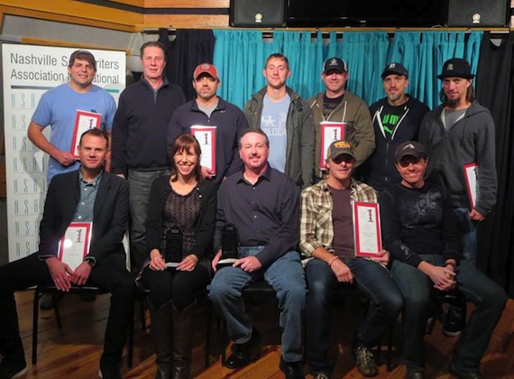 Front Row (seated L-R): Troy Verges, Maggie Cavender Award recipient Erika Wollam Nichols, Stephen Foster Award recipient Mark Ford, Kelley Lovelace, NSAI President Lee Thomas Miller. Second Row (standing L-R): Rhett Akins, NSAI Executive Director Bart Herbison, Dan Couch, Ashley Gorley, Ben Hayslip, Brett Warren, Brad Warren