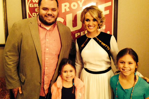 Arista Nashvilles Carrie Underwood recently visited with WSIX Michael Bryan and his two daughters after a recent performance on the Grand Ole Opry at Nashvilles Ryman Auditorium.