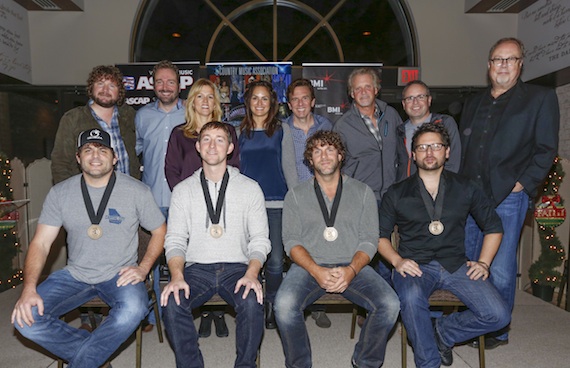 Pictured (L-R, Back row): Combustion's Chris Van Belkom, Sony/ATV's Josh Van Valkenburg, BMI's Leslie Roberts, ASCAP's LeAnn Phelan, producer Dann Huff, Combustion's Chris Farren, Warner/Chappell's Steve Markland and UMG's Mike Dungan. Pictured (L-R, Front row): Songwriters Rhett Akins and Ashley Gorley, Billy Currington and songwriter Chris DeStefano. Photo by Ed Rode. 