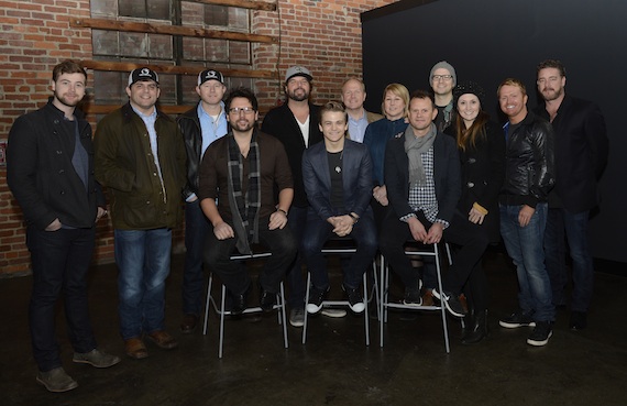 Back row (L-R): Jimmy Robbins; Rhett Akins; Ben Hayslip; Dallas Davidson; Tomlinson; CMA Chief Executive Officer Sarah Trahern; Luke Laird; Natalie Hemby; Shane McAnally, who is also a member of the CMA Board; CMA Board member Rob Beckham. Front row (L-R): Chris DeStefano; Hunter Hayes; Troy Verges.