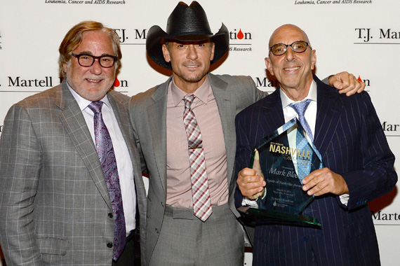 Creative Artist Agency's Rod Essig, Tim McGraw, and winner of the Spirit of Nashville Award Mark Bloom pose backstage, Photo: Rick Diamond/Getty Images