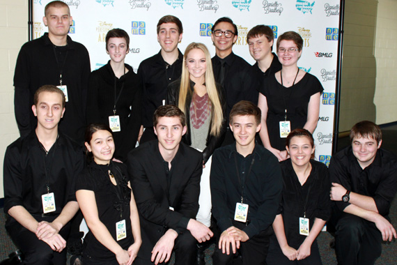 Bradbery (center) visits with children in Houston, TX