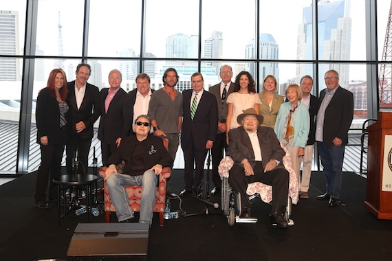 Pictured (Front, L-R): Mac Wiseman and Ronnie Milsap. (Back, L-R): Victoria Shaw, Owner of Victoria Shaw Songs; Kix Brooks; Troy Tomlinson, President and CEO of Sony/ATV Music Publishing; Jeff Walker, President of AristoMedia Group; Brett James, Owner/CEO of Cornman Music; Ed Hardy, CMA Board Chairman; John Esposito, President and CEO of Warner Music Nashville and CMA Board President Elect; Kerri Edwards, President of KP Entertainment; Sarah Trahern, CMA CEO; Jo Walker-Meador, former CMA Executive Director and Country Music Hall of Fame member; Jody Williams, Vice President Writer/Publisher Relations at BMI; and Ed Benson, former CMA Executive Director. Photo: Alan Poizner / CMA